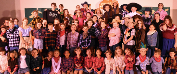 Pictured are a host of happy heroes. Their teenage counterparts are devising a piece for presentation at the local TheatreFest in Christchurch this year.